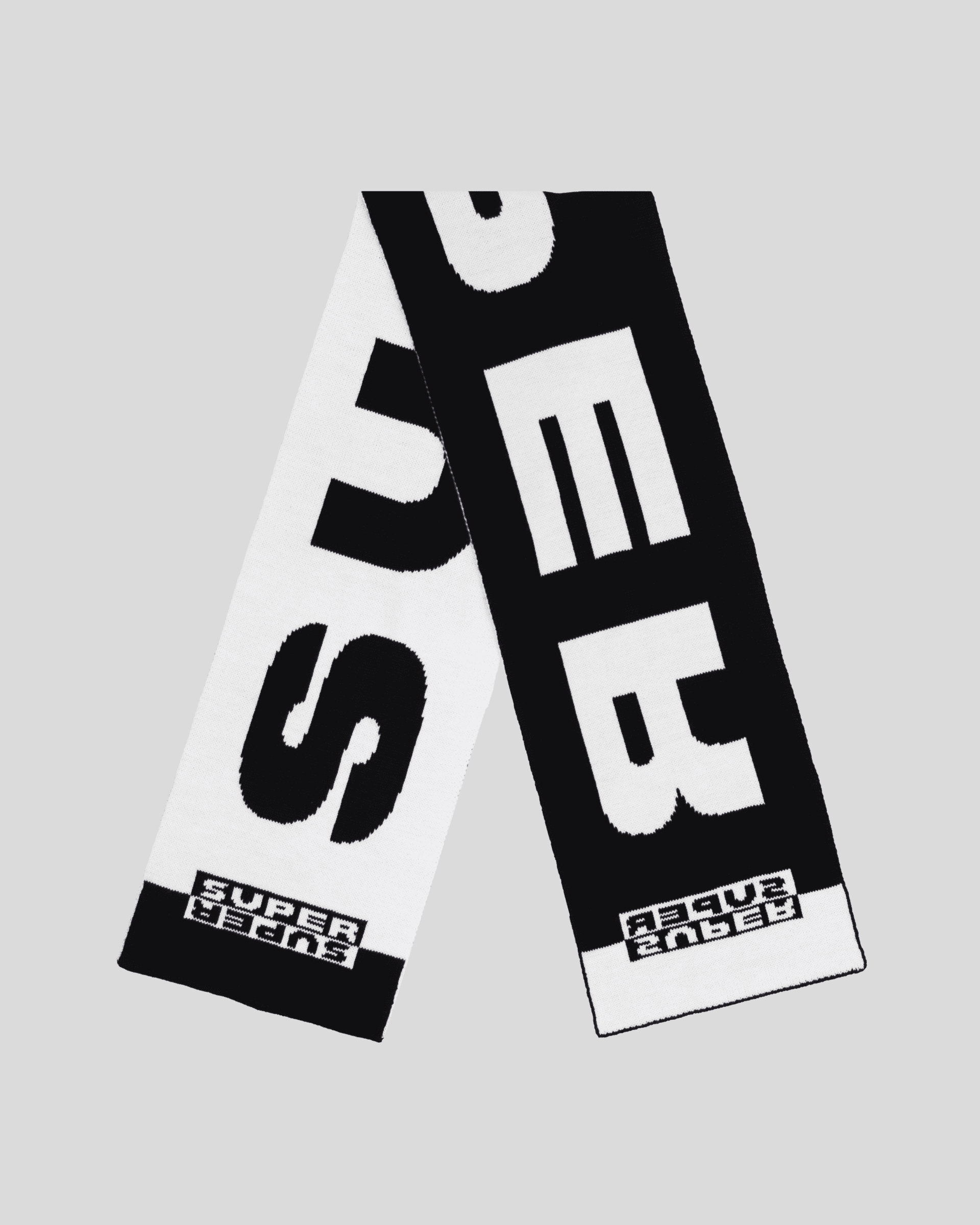 Black and white scarf with Super Super wordmark